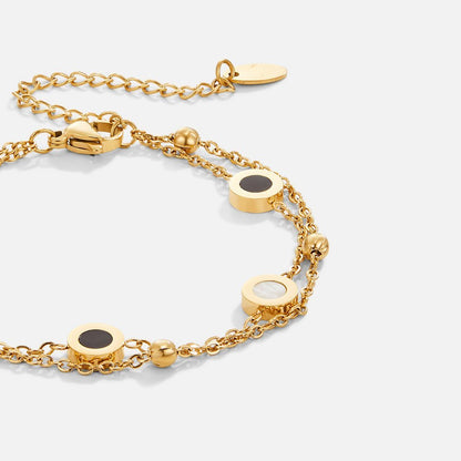 Armband med onyx och vit sten