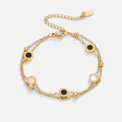 Armband med onyx och vit sten